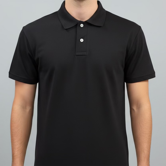 Person wearing a black polo shirt against a gray background