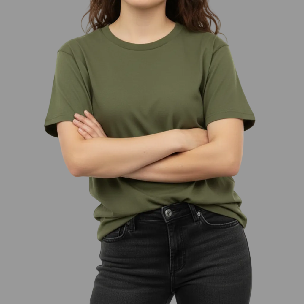 Person wearing a plain green t-shirt against a neutral background