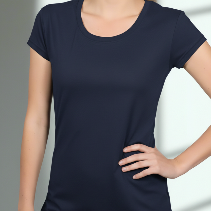 Person wearing a navy t-shirt against a neutral background