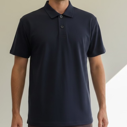Man wearing a navy merino polo shirt and shorts in a store setting