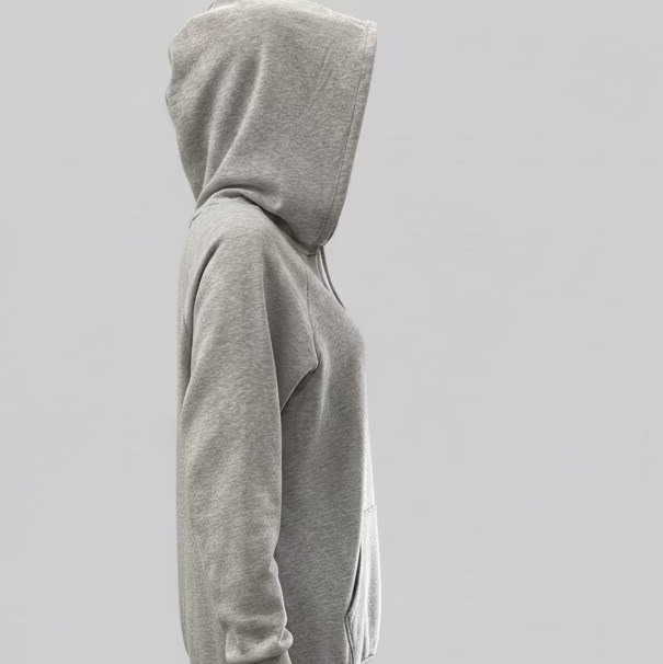 Gray hoodie worn by a person on a light gray background