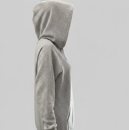 Gray hoodie worn by a person on a light gray background