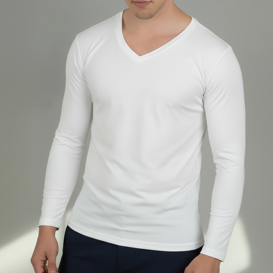 Person wearing a plain white V-neck t-shirt against a neutral background
